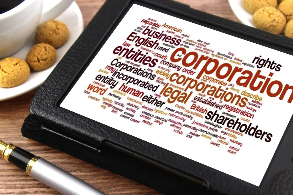 Tablet showing a word cloud for corporation and other types of entities and words for entity management